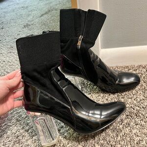 Black ankle boots with clear heel